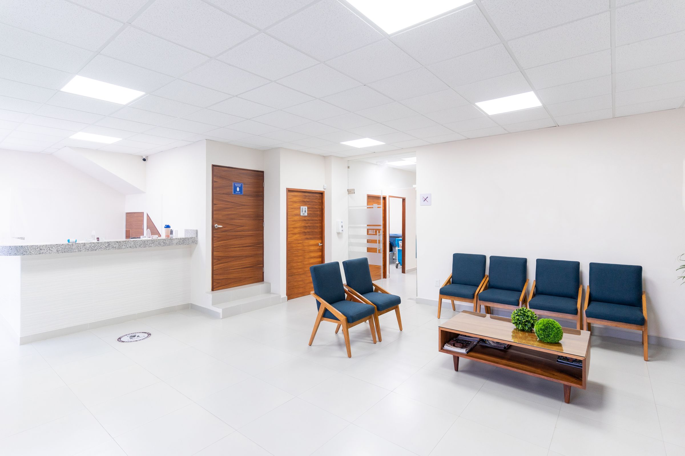 A bright clinic reception and waiting area